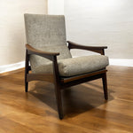 Load image into Gallery viewer, Lounge Chair on a wooden floor with beige walls
