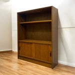 Load image into Gallery viewer, bookcase cabinet with shelf &amp; cupboards on a wooden floor
