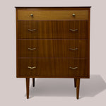 Load image into Gallery viewer, Wooden dresser with four drawers on a plain background
