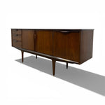 Load image into Gallery viewer, Wooden sideboard with drawers and doors on a white background
