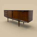 Load image into Gallery viewer, Wooden sideboard with drawers and doors on a beige background
