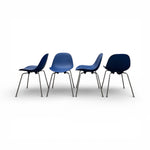Load image into Gallery viewer, Four blue chairs with black legs on a white background
