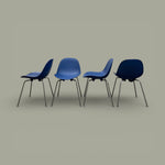 Load image into Gallery viewer, Four blue chairs with metal legs on a gray background

