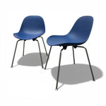 Load image into Gallery viewer, Two blue chairs with metal legs on a white background

