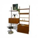 Load image into Gallery viewer, Wooden wall unit with shelves, cabinet, and stool on a white background
