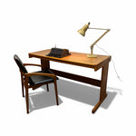 Load image into Gallery viewer, Wooden desk with a typewriter and lamp on a white background
