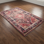 Load image into Gallery viewer, Decorative rug with intricate patterns on a wooden floor
