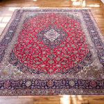 Load image into Gallery viewer, Decorative rug with intricate patterns on a wooden floor
