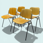Load image into Gallery viewer, Four yellow chairs with black legs on a light blue background
