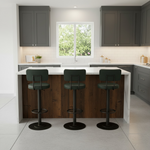 Load image into Gallery viewer, Modern kitchen with dark gray cabinets, white countertops, and three black bar stools.
