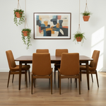 Load image into Gallery viewer, TERRACOTTA DINING CHAIRS AROUND A DINING TABLE WITH ARTWORK AND PLANTS
