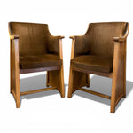 Load image into Gallery viewer, Pair of brown upholstered chairs with wooden frames on a white background
