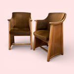 Load image into Gallery viewer, Two brown armchairs on a light pink background
