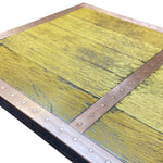 Load image into Gallery viewer, Wooden surface with metal frame and rivets on a white background

