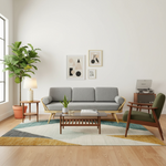 Load image into Gallery viewer, Modern living room with gray sofa, wooden coffee table, and decorative elements.
