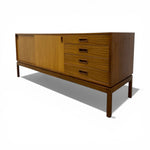 Load image into Gallery viewer, Wooden sideboard with drawers on a white background
