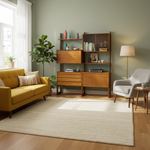 Load image into Gallery viewer, Living room with yellow sofa, wooden bookshelf, and white armchair.
