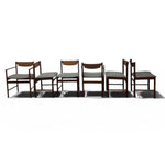 Load image into Gallery viewer, Set of six wooden chairs with cushioned seats on a white background
