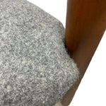 Load image into Gallery viewer, Close-up of a textured gray cushion on a wooden chair.
