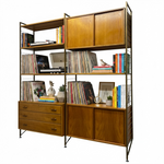 Load image into Gallery viewer, Wooden bookshelf with shelves, cabinets, and drawers against a white background
