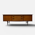 Load image into Gallery viewer, Wooden sideboard with multiple drawers on a white background
