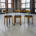 Load image into Gallery viewer, THREE CHAIRS WITH BLUE LEATHER SEATS IN A LOFT APARTMENT
