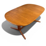 Load image into Gallery viewer, Wooden dining table with a white background
