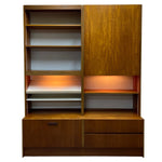 Load image into Gallery viewer, Wooden bookshelf with open shelves and a closed cabinet on a white background
