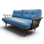 Load image into Gallery viewer, Blue sofa with wooden armrests on a white background
