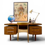 Load image into Gallery viewer, Wooden desk with chair, globe, lamp, and anatomical poster on a white background
