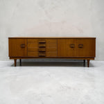 Load image into Gallery viewer, sideboard on a concrete floor
