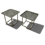 Load image into Gallery viewer, Two square side tables with textured gray tops and polished gold metal geometric frames, shown on a white background with soft shadows.
