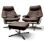 Load image into Gallery viewer, A mid-century modern furniture set featuring two matching brown leather swivel lounge chairs and a matching ottoman, all with chrome star base frames, photographed on a white background.
