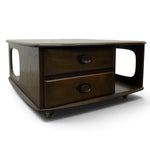 Load image into Gallery viewer, Mid-century modern dark wood coffee table with two drawers, round metal pulls, and side cutouts, shown on a white background.
