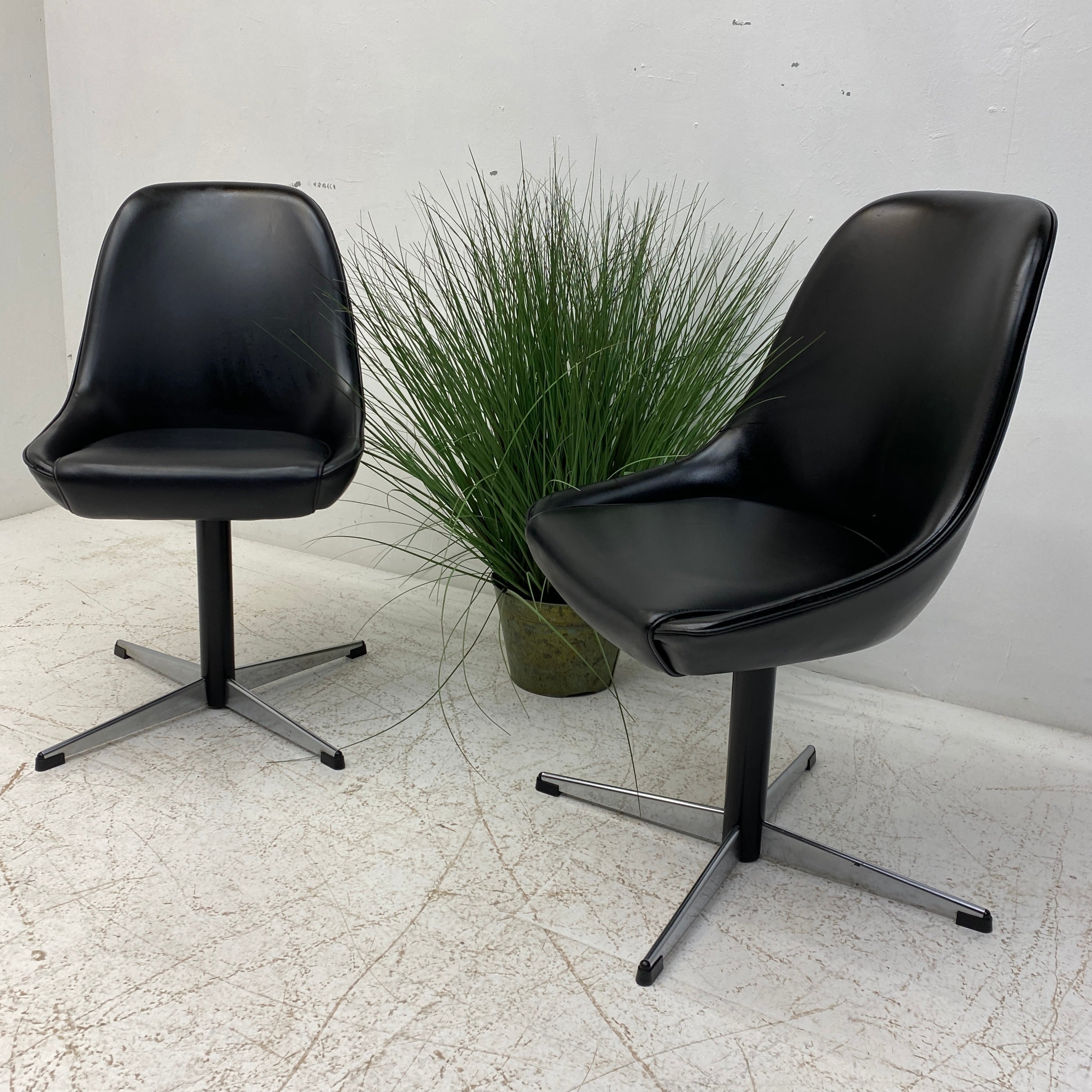 Side of Black Vinyl Swivel Chairs