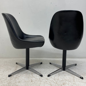 Back Of Black Vinyl Swivel Chairs