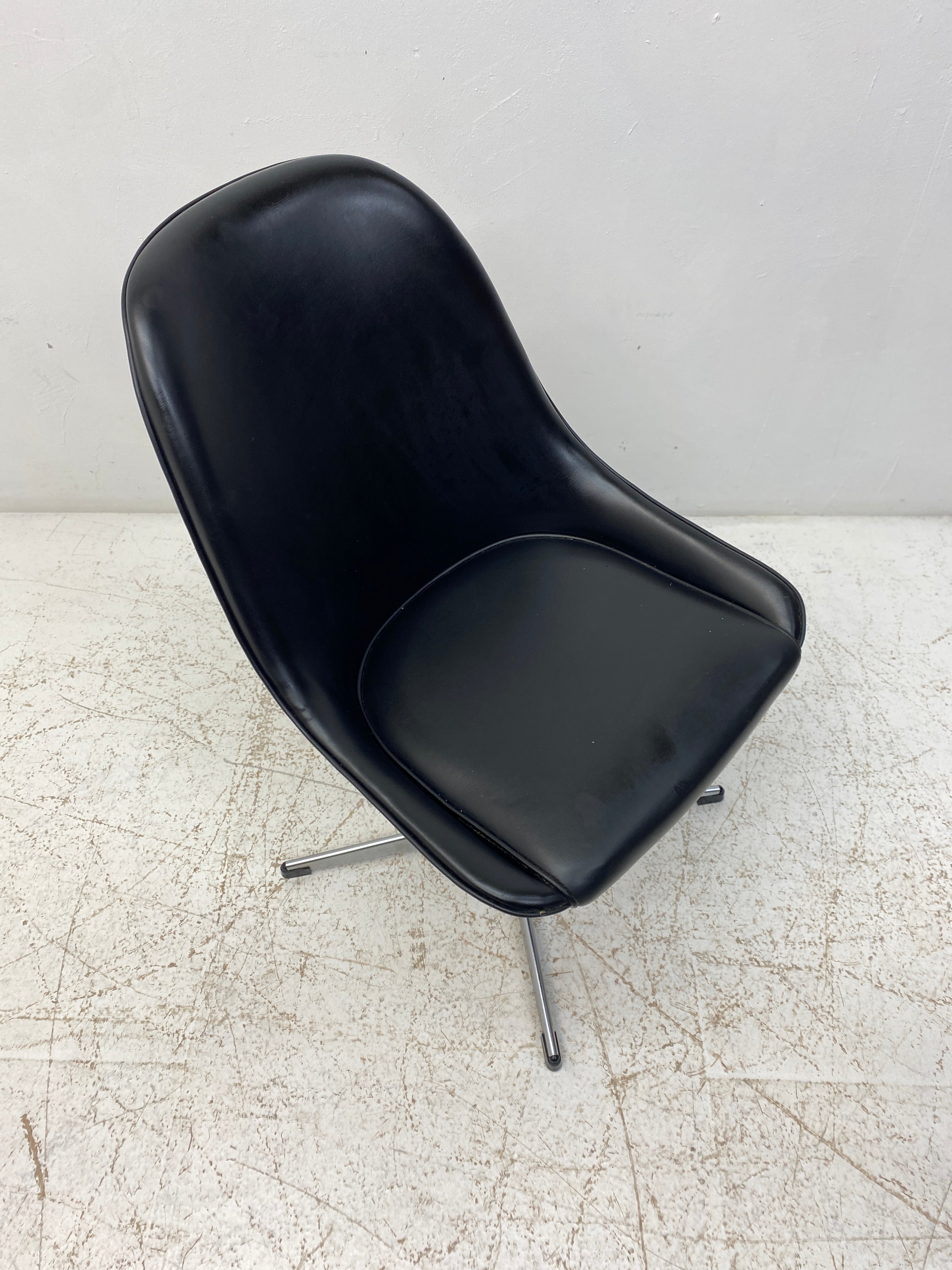 Seat Of Black Vinyl Swivel Chairs